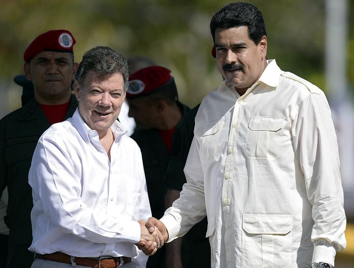 Juan Manuel Santos y Nicolás Maduro.